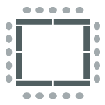 Tables arranged in large square with chairs around outside edges
