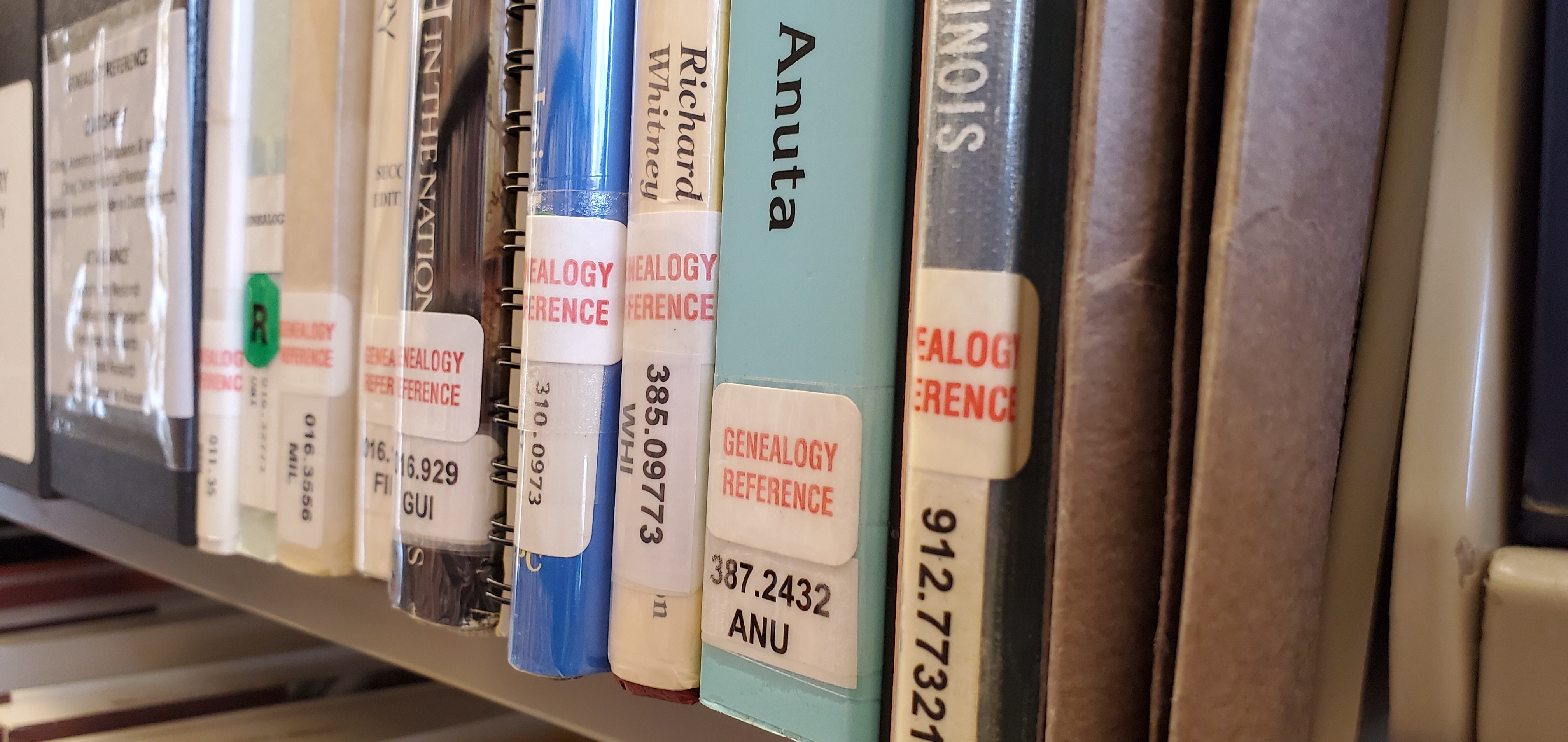 Genealogy reference shelf with non fiction books