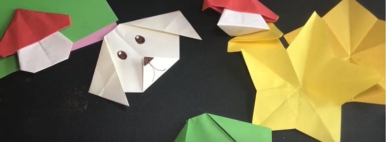 folded origami stars, mushrooms, and creatures