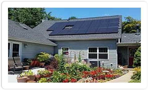 photo of a home with solar panels
