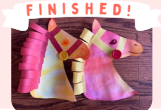 Labeled "Finished!" A photo of two completed watercolor horse heads.