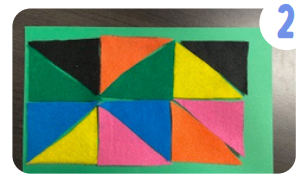 Labeled "two." A pattern of colorful felt triangles are arranged a sheet of green cardstock.