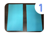 Labeled "one." A blue sheet of cardstock cut in half down the middle.