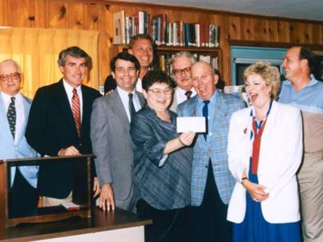 Library trustees receiving grant check in 1986